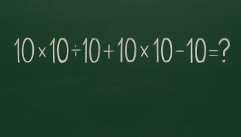 Matematická hádanka napsaná křídou na zelené školní tabuli: 10 × 10 ÷ 10 + 10 × 10 − 10 = ?